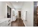 Hallway bathroom featuring white cabinets, modern fixtures and walk-in closet at 413 Cardinal Dr, Jamestown, IN 46147