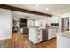 Stylish kitchen with white cabinets, granite countertops, and an open view to the living area at 413 Cardinal Dr, Jamestown, IN 46147