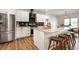 Contemporary kitchen with a large island, white cabinetry, and stainless steel appliances at 413 Cardinal Dr, Jamestown, IN 46147