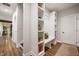 Organized mud room with storage shelves, built-in bench and coat racks at 413 Cardinal Dr, Jamestown, IN 46147