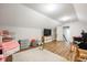 Bright play room featuring wood floors and plenty of space for activities at 413 Cardinal Dr, Jamestown, IN 46147