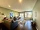 Cozy living room with ample natural light, comfortable seating, and stylish decor at 4310 Yarrow Ct, Indianapolis, IN 46237