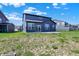 The home features a backyard with a sliding glass door and a concrete patio at 5461 Oak Knoll Dr, Whitestown, IN 46075