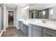 Bathroom featuring a double sink vanity with white countertops and tile flooring at 5461 Oak Knoll Dr, Whitestown, IN 46075