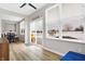 Bright dining room with hardwood floors and a sliding glass door at 5461 Oak Knoll Dr, Whitestown, IN 46075