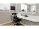 Bright home office space featuring a large window and a built in desk at 5461 Oak Knoll Dr, Whitestown, IN 46075