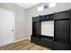 Mudroom featuring a hall tree with coat hooks, storage shelves, and seating at 5461 Oak Knoll Dr, Whitestown, IN 46075