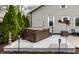 Backyard deck with a hot tub, perfect for outdoor relaxation at 5626 Winthrop Ave, Indianapolis, IN 46220