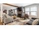 Inviting living room features a fireplace, modern furnishings, and a comfortable atmosphere at 5626 Winthrop Ave, Indianapolis, IN 46220