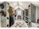 Spacious walk-in closet with ample storage, organization, and lighting at 5626 Winthrop Ave, Indianapolis, IN 46220