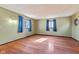 Bedroom featuring hardwood floors, natural light, and green paint at 6724 E Spring Lake Rd, Mooresville, IN 46158