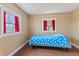 Bedroom featuring hardwood floors, natural light, and neutral paint at 6724 E Spring Lake Rd, Mooresville, IN 46158