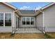 Back exterior of home features multiple windows providing lots of natural light at 7091 Lillian Pl, Cumberland, IN 46229