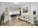 Bright, airy entryway leading to an open-concept living space with wood-look flooring at 7091 Lillian Pl, Cumberland, IN 46229