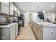 Beautiful kitchen features stainless steel appliances, granite countertops, and an island at 7091 Lillian Pl, Cumberland, IN 46229