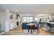 Open concept living and kitchen area with modern decor and hardwood floors at 7091 Lillian Pl, Cumberland, IN 46229