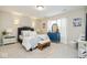 Serene main bedroom with elegant decor, soft lighting, and a relaxing ambiance, bright natural light at 7091 Lillian Pl, Cumberland, IN 46229