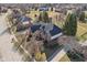 Aerial view of a community home with a well-manicured lawn and mature trees on a sunny day at 7238 River Birch Ln, Indianapolis, IN 46236