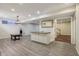 Finished basement space with bar area, recessed lighting, and durable flooring at 7238 River Birch Ln, Indianapolis, IN 46236