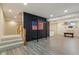 Finished basement showcasing a workout area and stylish flooring at 7238 River Birch Ln, Indianapolis, IN 46236