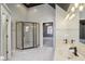 This bathroom features double sinks and a glass enclosed shower at 7238 River Birch Ln, Indianapolis, IN 46236