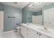 A spacious bathroom with dual sinks, white cabinets, and neutral paint, exuding a sense of calm at 7238 River Birch Ln, Indianapolis, IN 46236