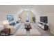 This bonus room features bright natural light and comfortable seating arrangements at 7238 River Birch Ln, Indianapolis, IN 46236