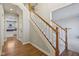 Stairway with carpeted steps and a white railing at 7238 River Birch Ln, Indianapolis, IN 46236