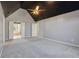 This spacious main bedroom features a vaulted ceiling and neutral decor at 7238 River Birch Ln, Indianapolis, IN 46236
