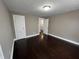 Bedroom featuring hardwood floors and neutral-colored walls at 749 W 32Nd St, Indianapolis, IN 46208
