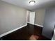 Bedroom with dark wood floors, neutral walls, and ample natural light at 749 W 32Nd St, Indianapolis, IN 46208
