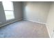 This carpeted bedroom is a blank slate, awaiting your personal touch and decor ideas at 8105 Milender Blvd, Indianapolis, IN 46237
