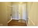 The mud room features wood-look floors, a white door, and wire shelving at 8105 Milender Blvd, Indianapolis, IN 46237