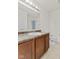 Neutral bathroom with a vanity, toilet, and shower/tub combo at 8547 S Tibbs Ave, Indianapolis, IN 46217