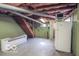 Image of basement featuring stairs, water heater, and refrigerator at 9464 N State Rd 135, Morgantown, IN 46160
