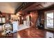 Spacious kitchen featuring stainless steel appliances, wood flooring, and convenient access to the home's exterior at 9464 N State Rd 135, Morgantown, IN 46160