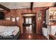 Cozy living room with wood walls and an open floor plan at 9464 N State Rd 135, Morgantown, IN 46160