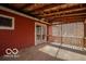 Relaxing covered porch features a ceiling fan and exterior lighting at 9464 N State Rd 135, Morgantown, IN 46160