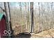 A view of the trees and part of a house on the property at 9464 N State Rd 135, Morgantown, IN 46160