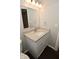 Bathroom features a vanity with a granite countertop and a towel rack at 9685 Glowing Flame Dr, Fishers, IN 46037