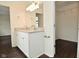Bathroom with double sinks, granite countertops, and a walk-in closet at 9685 Glowing Flame Dr, Fishers, IN 46037