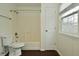 Bathroom featuring a clean toilet, shower-tub, and natural light at 9685 Glowing Flame Dr, Fishers, IN 46037