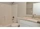 Modern bathroom features a granite vanity countertop, shower, and tub at 9685 Glowing Flame Dr, Fishers, IN 46037
