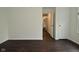 Hardwood floors add style to this bedroom, along with natural light from the window at 9685 Glowing Flame Dr, Fishers, IN 46037