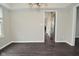 Dining room featuring wood flooring and a view into the adjacent rooms of the house at 9685 Glowing Flame Dr, Fishers, IN 46037