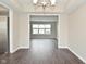 View into the dining room from the kitchen offering sightlines to the outdoors at 9685 Glowing Flame Dr, Fishers, IN 46037