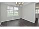 Bright dining area with a chandelier and large window at 9685 Glowing Flame Dr, Fishers, IN 46037
