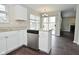 Kitchen with white cabinets, stainless steel appliances, and hardwood floors at 9685 Glowing Flame Dr, Fishers, IN 46037