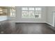 Open floorplan showcasing kitchen and living spaces with a fireplace at 9685 Glowing Flame Dr, Fishers, IN 46037