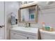 Bright bathroom featuring a white vanity and modern fixtures offering a clean and functional design at 115 N Spring St, Greenfield, IN 46140